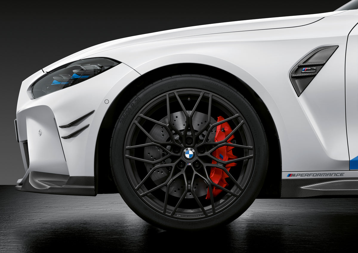 BMW G80 M3 brake caliper and disc behind M Performance wheel - G8X brake squeal guide