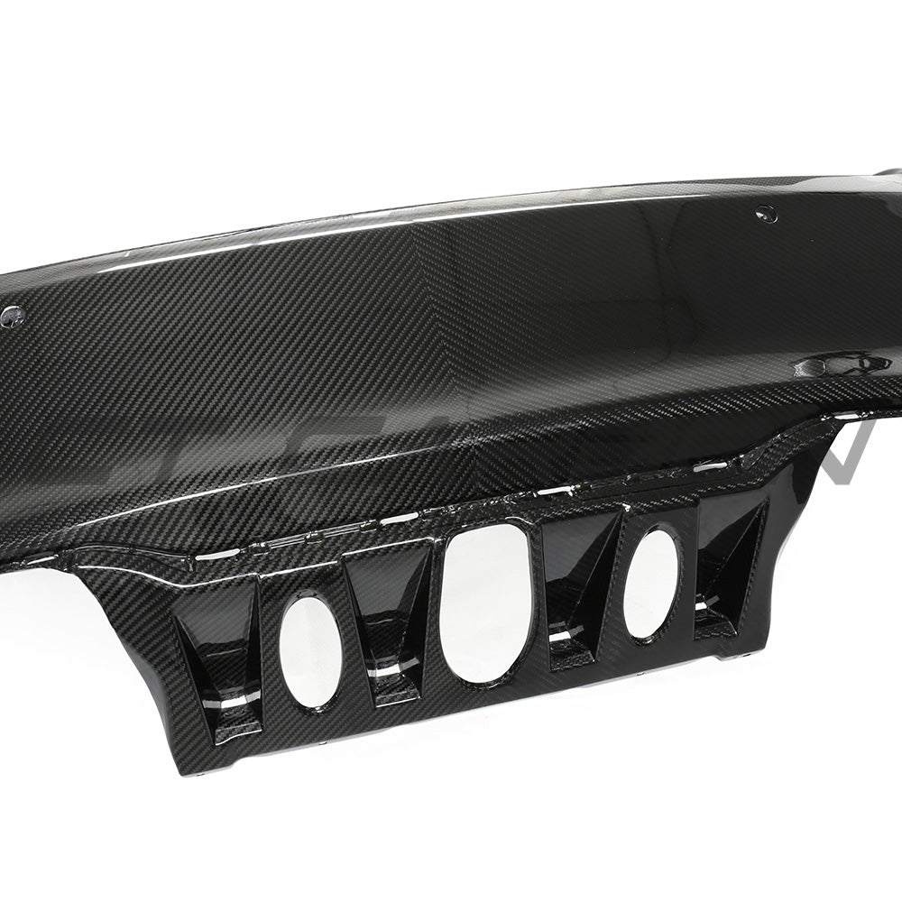 BMW F87 M2 Carbon Pre-Preg Fibre Rear Bumper by CT Carbon, showcasing lightweight, high-performance automotive bumper detail.