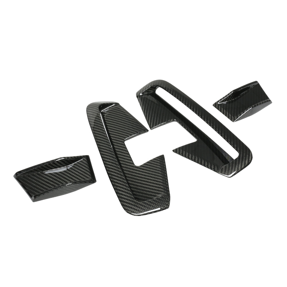 Set of four BMW 4 Series G22/G23 carbon fiber vent accessories by CT Carbon, designed for a sleek, custom look.