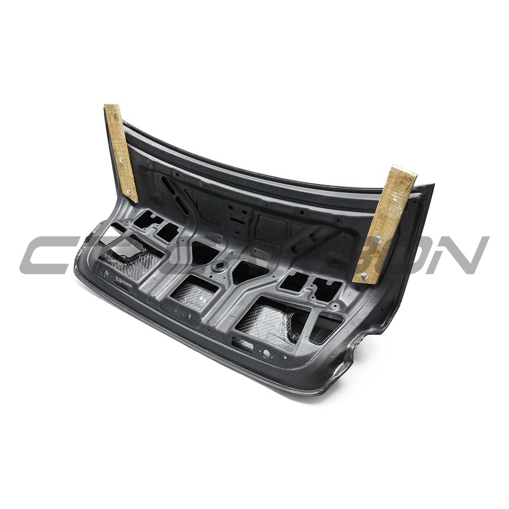 BMW G80 M3 and G20 3 Series full carbon fibre bootlid by CT Carbon, showing the sleek, lightweight trunk with carbon fiber finish.
