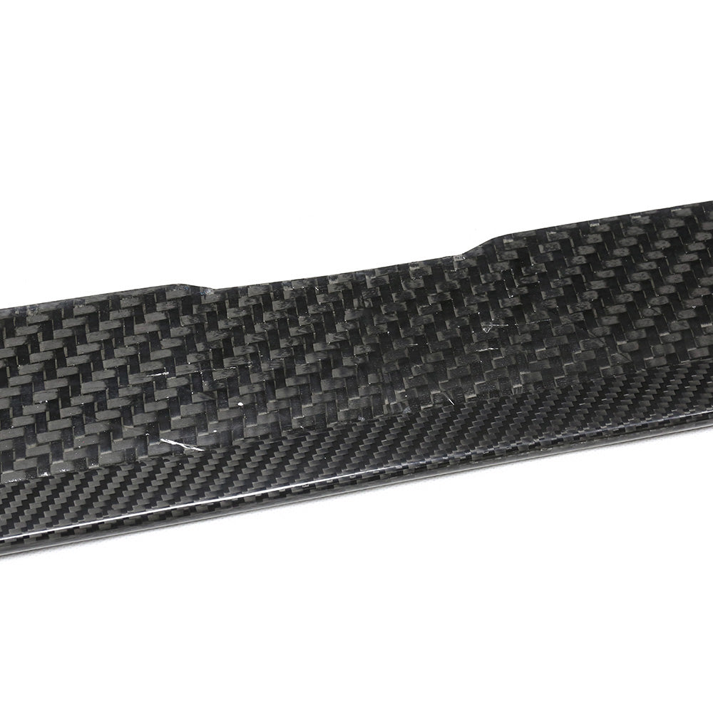 BMW G87 M2 carbon fibre side skirts by CT Carbon, showcasing sleek, aerodynamic design for enhanced sporty look.