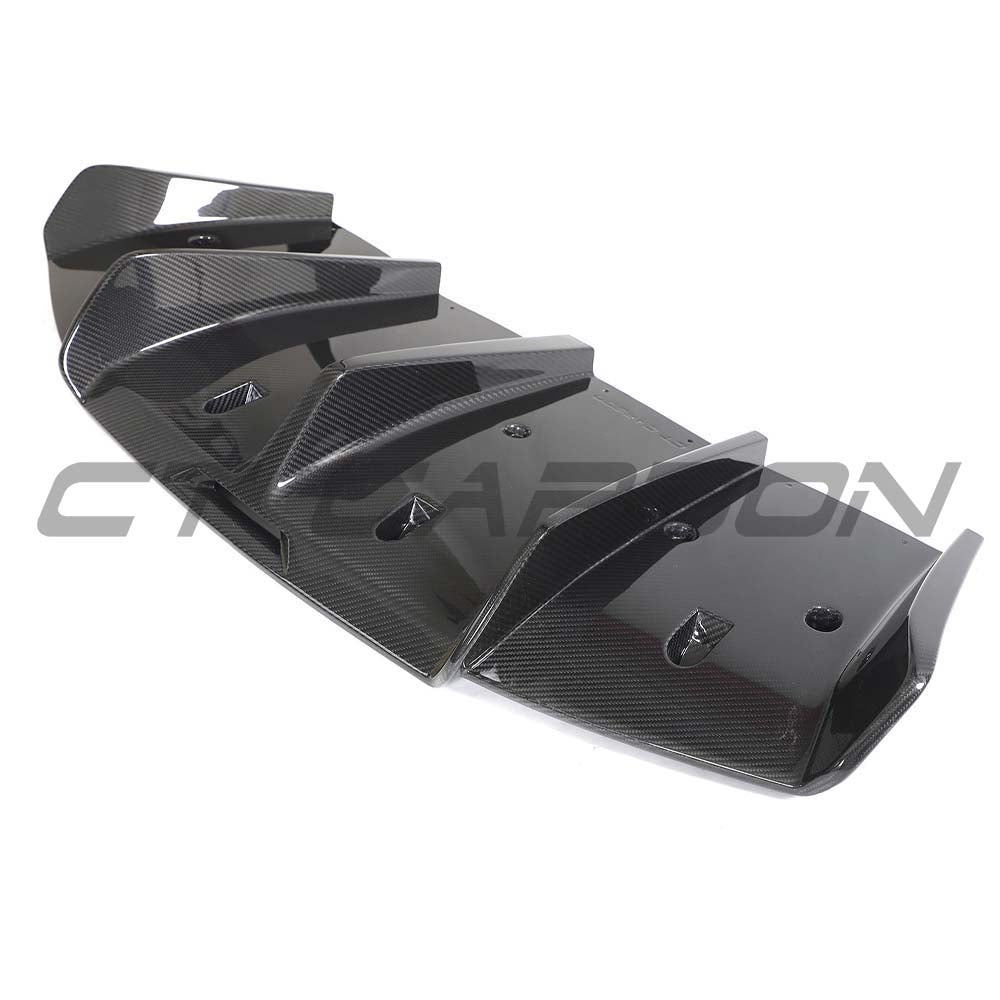 CT Carbon Lotus Emira full carbon fibre kit V2 installed on the car, showcasing lightweight, sleek carbon fibre panels and accents.