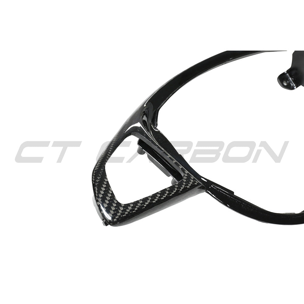 Mercedes AMG carbon fiber steering wheel trim accessory by CT Carbon, showcasing sleek, textured carbon fiber finish for a luxury interior.