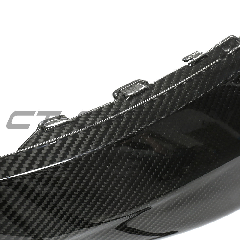 BMW F87 M2 Carbon Pre-Preg Fibre Rear Bumper by CT Carbon, showcasing sleek black carbon fibre with precise design details.