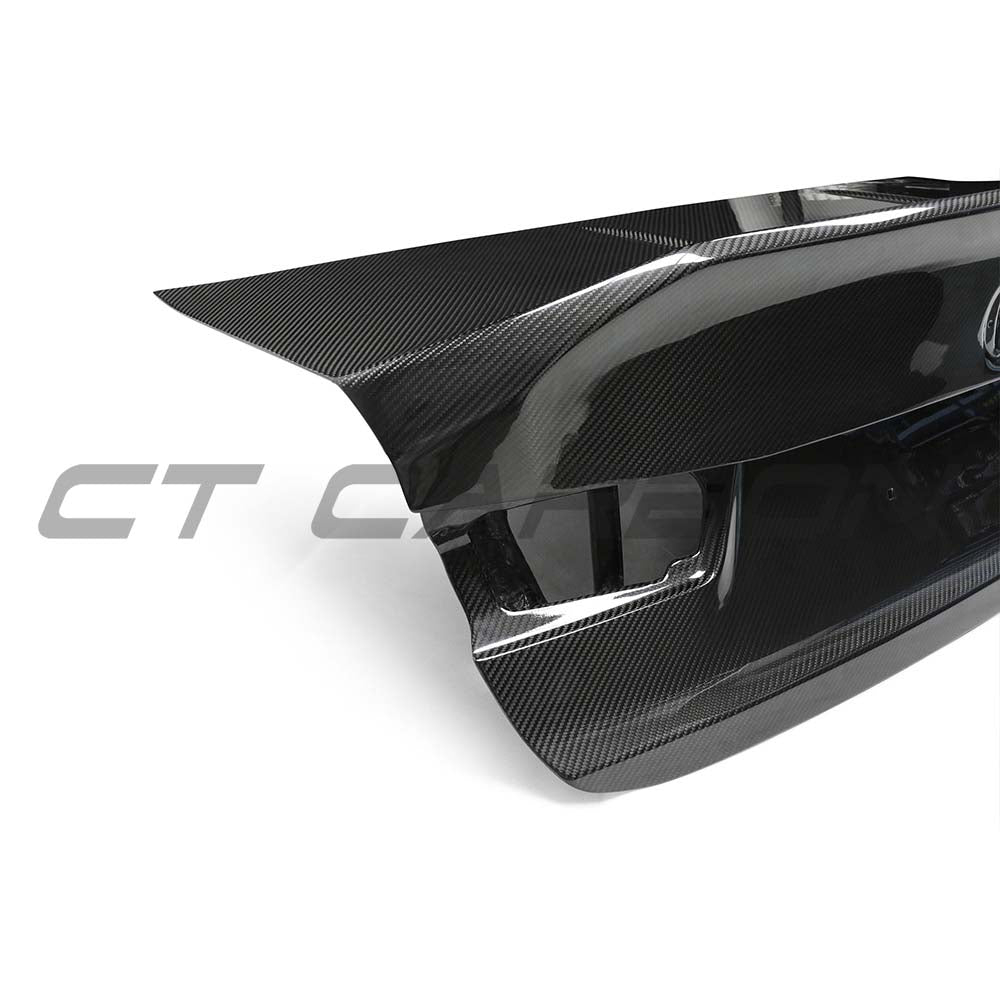 BMW G80 M3 and G20 3 Series full carbon fibre bootlid by CT Carbon, showing the lightweight, glossy carbon trunk surface.