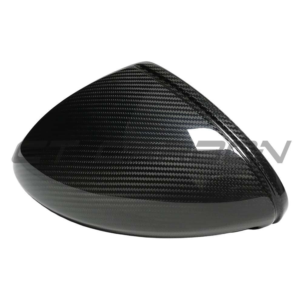 RHD dry carbon mirror covers for Porsche 718 Cayman and Boxster 2019-2021 by CT Carbon, shown on car mirrors.