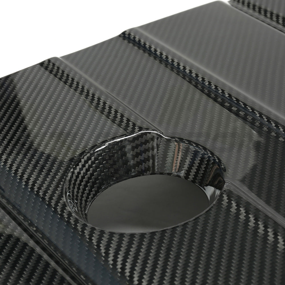 Carbon fiber engine cover for Toyota Supra A90 3.0T B58 from CT Carbon, showcasing the sleek, lightweight design.