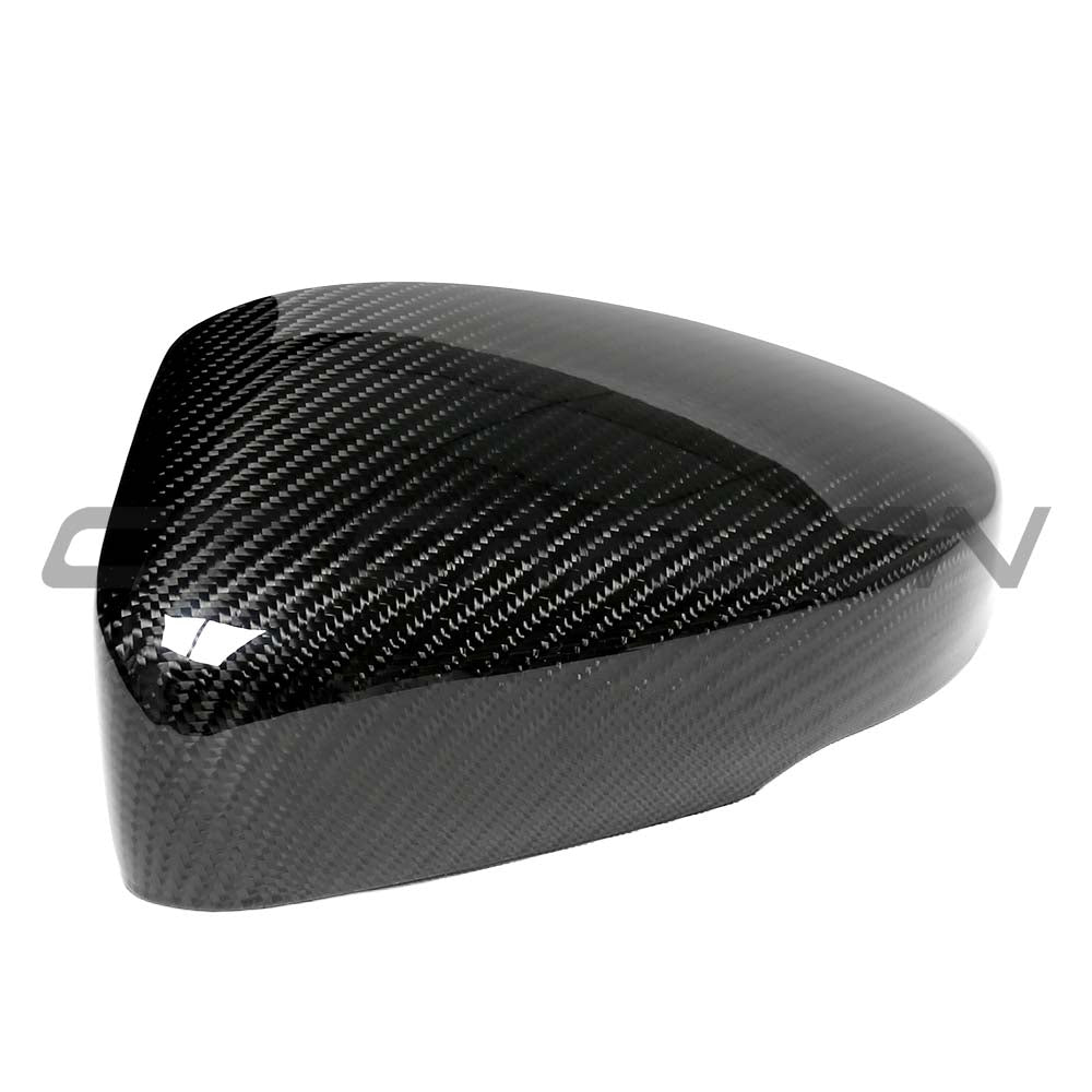 VW Polo MK5 2015-2018 CT Carbon dry carbon fiber mirror cover replacements on car mirrors, showcasing sleek, lightweight design.
