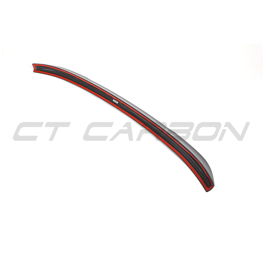 BMW G02 X4 and F98 X4M carbon fibre spoiler by CT Carbon, showing the sleek, aerodynamic design on the vehicle.
