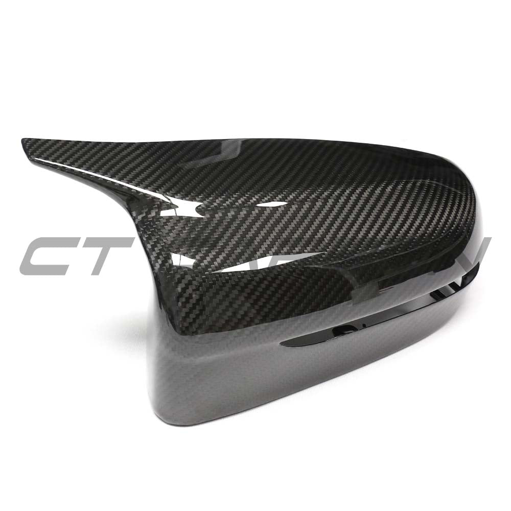 BMW G42 2 Series 2022+ right-hand drive dry carbon mirror cover replacement by CT Carbon, showcasing sleek carbon fiber finish.