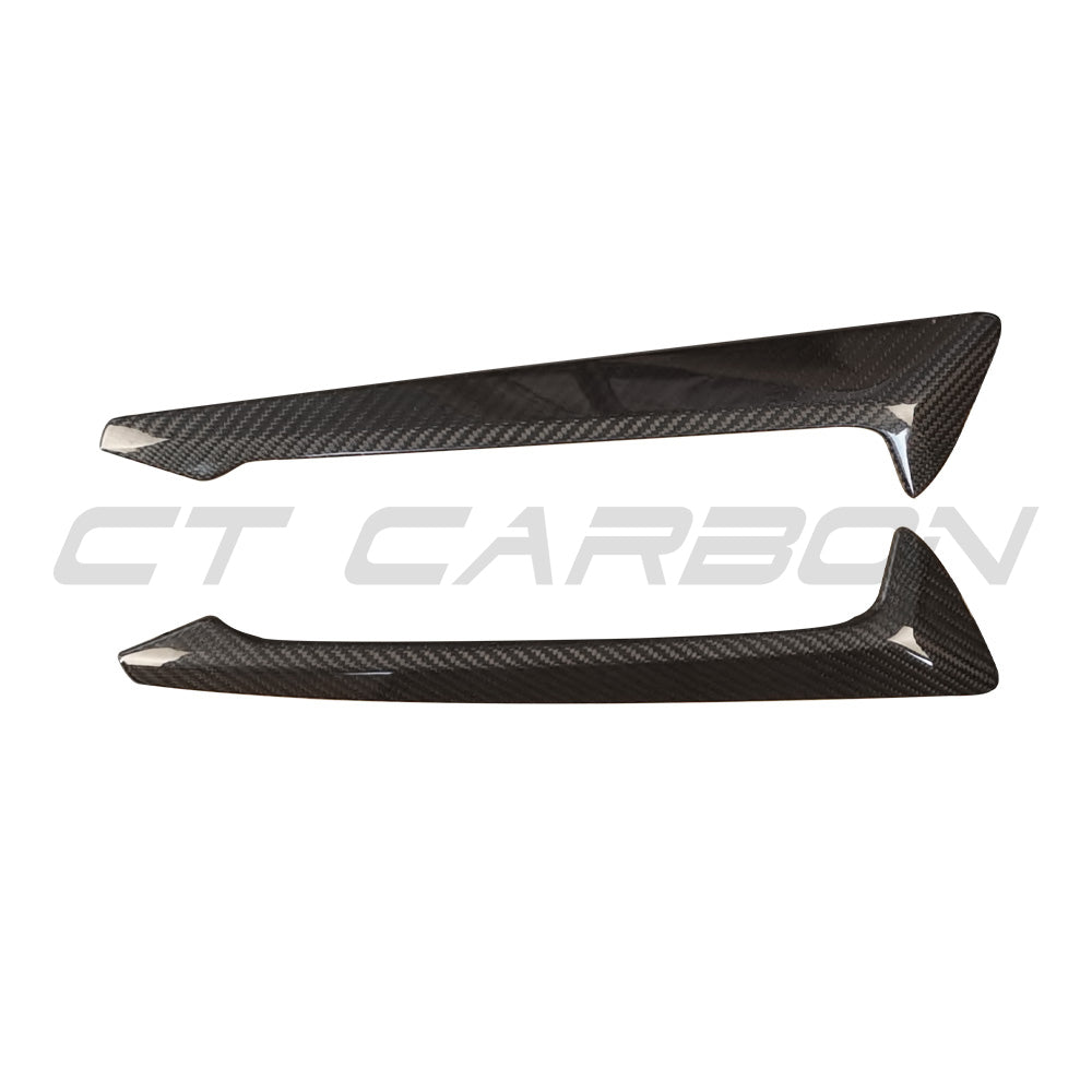 BMW G05 X5 2019-2023 carbon fibre fender trim add-on from CT Carbon, showcasing sleek, lightweight accessory for vehicle enhancement.