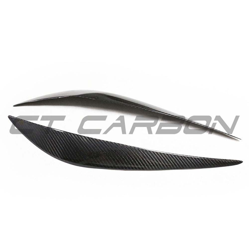BMW F30 3 Series 2011-2018 dry carbon fiber eyelid accessories by CT Carbon, showing sleek, textured carbon fiber eyelids on the vehicle.