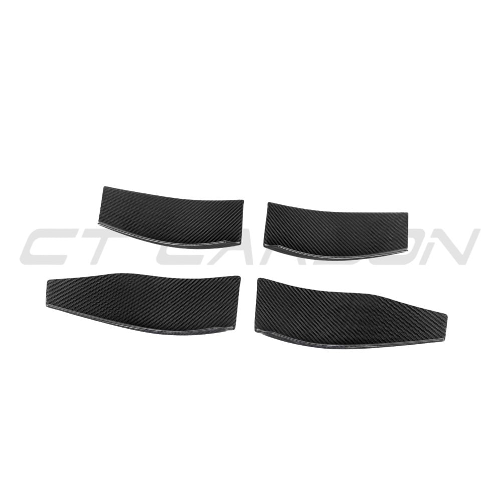 BMW M3 M4 G80 G82 carbon fibre front bumper canards by CT Carbon, sporty accessories for enhanced aerodynamics and style.