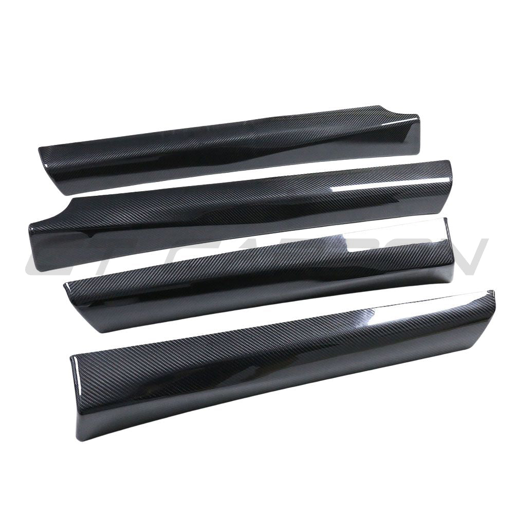 Carbon fiber interior door panel trim add-on for Tesla Model 3 (2017-2023) by CT Carbon, shown installed inside the vehicle.