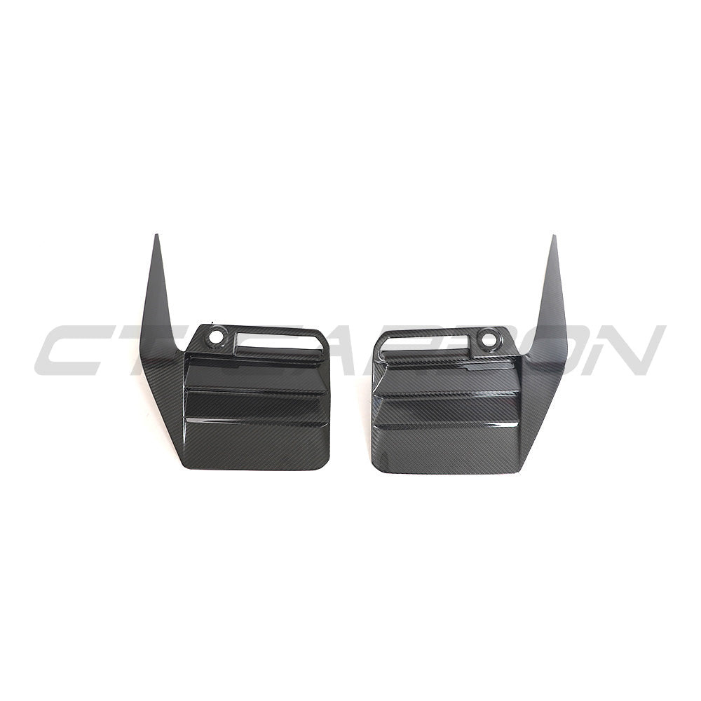 BMW G87 M2 2023 carbon fibre rear bumper trim by CT Carbon, showcasing sleek, textured black carbon fibre accessory.
