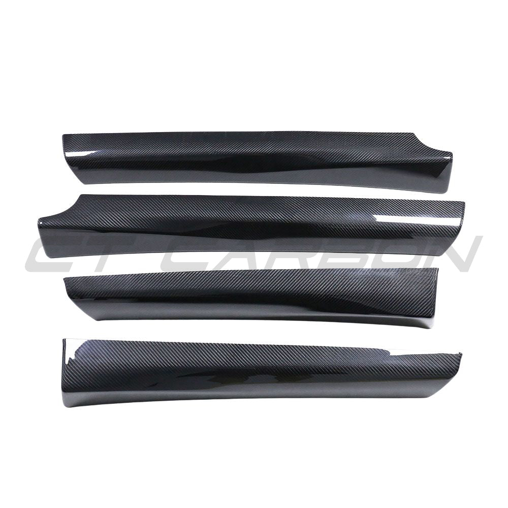 Tesla Model 3 carbon fibre interior door panel trim accessory by CT Carbon, showcasing sleek textured finish and precise fit.