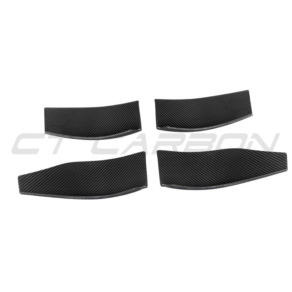 BMW M3 M4 G80 G82 G83 carbon fibre front bumper canards, CT Carbon V3 accessory, shown mounted on vehicle front bumper.