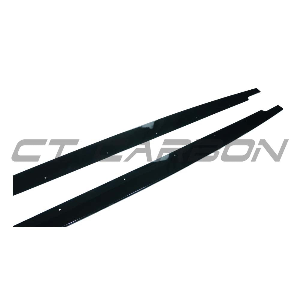 BMW M3 E90/E92 2006-2013 GLOSS BLACK SIDE SKIRTS by CT Carbon, sleek exterior automotive side skirts on a black car.