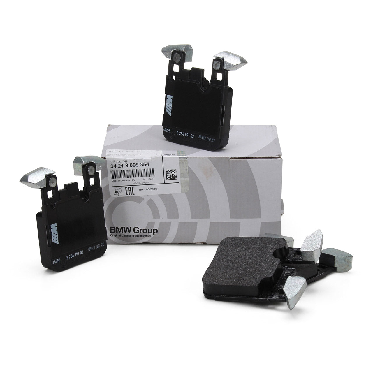Brake pads with a BMW Group branded box on a white background