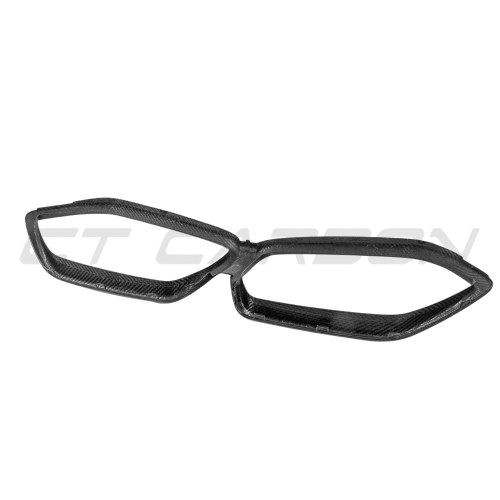 BMW X5M F95 and X6M F96 2023+ LCI OEM-style pre-preg carbon fibre grille frame by CT Carbon, showcasing sleek, lightweight design.