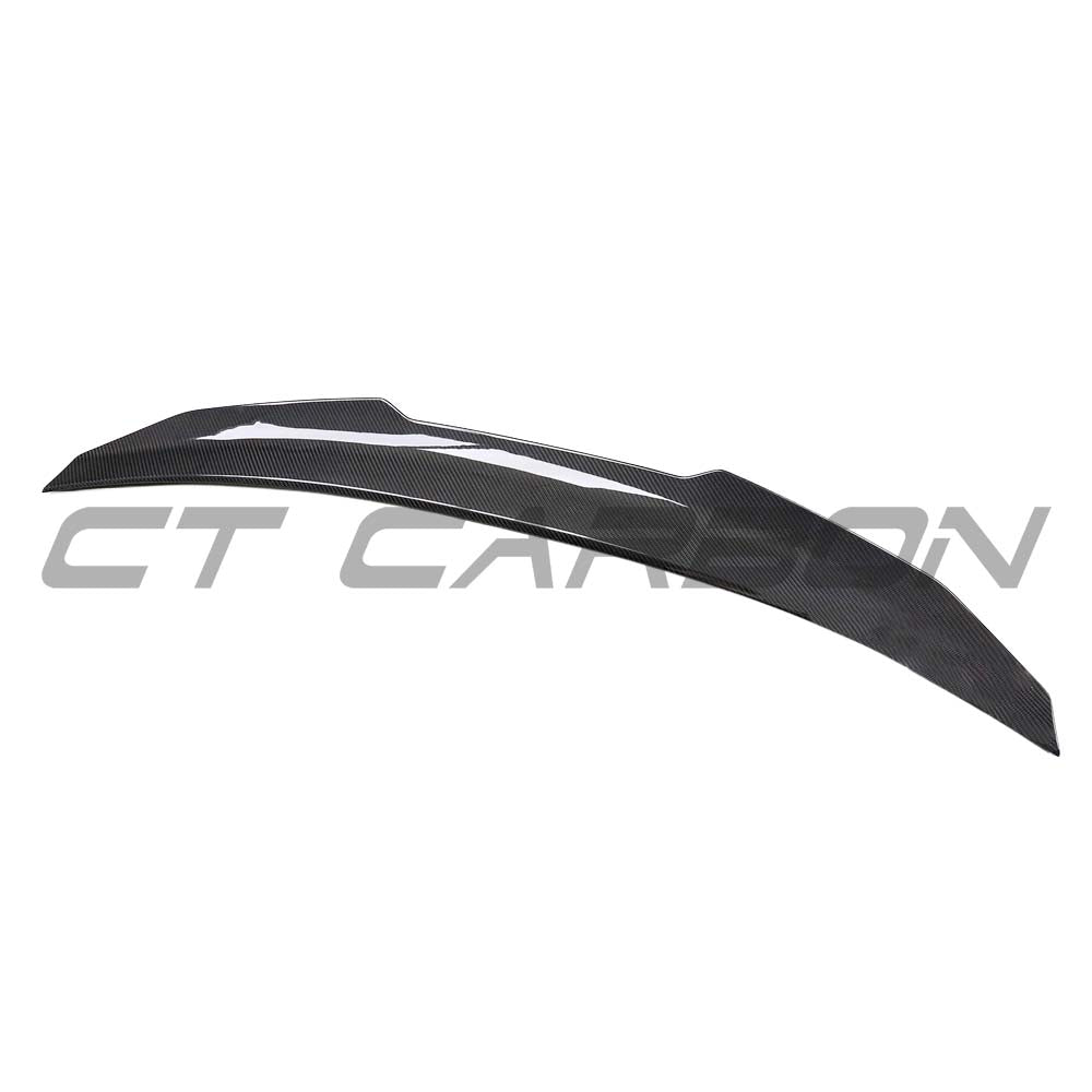 BMW G42 2 Series 2022+ dry carbon fiber rear spoiler by CT Carbon, showing a sleek, aerodynamic design mounted on the vehicle.
