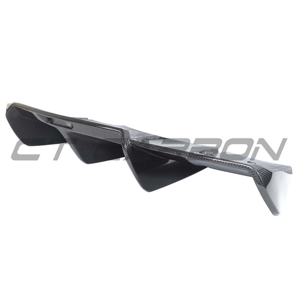 CT Carbon Lotus Emira full carbon fibre kit V2, showcasing lightweight, glossy carbon fiber panels on the sports car.