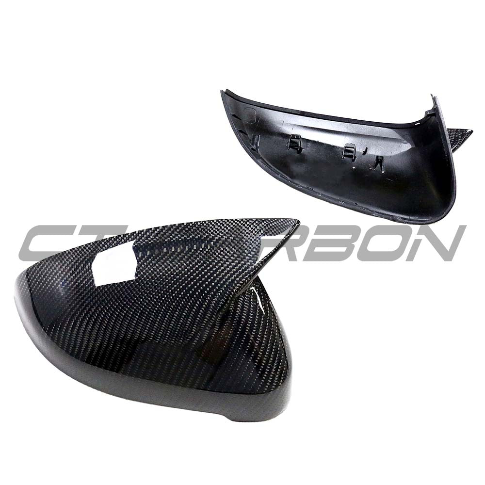 Audi A4 B9 2015-2023 carbon fiber mirror covers with blindspot assist by CT Carbon, showing sleek black finish on side mirrors.
