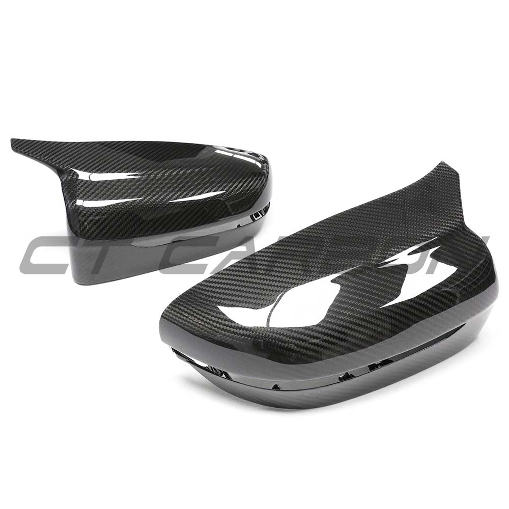BMW G42 2 Series 2022+ LHD dry carbon mirror cover replacements by CT Carbon, showing sleek, textured carbon fiber mirror covers.