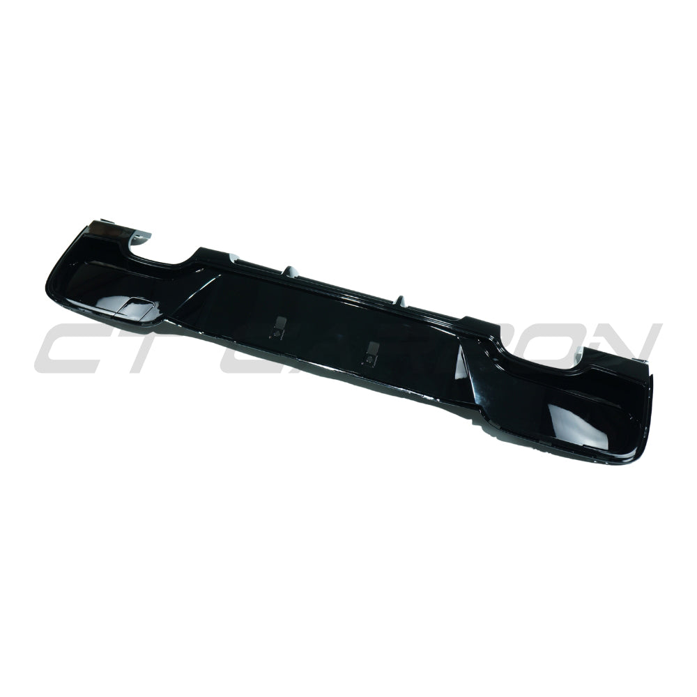 BMW 1 Series F20/F21 2012-2014 CT Carbon gloss black diffuser with dual tips, showing the sleek design and dual exhaust outlets.