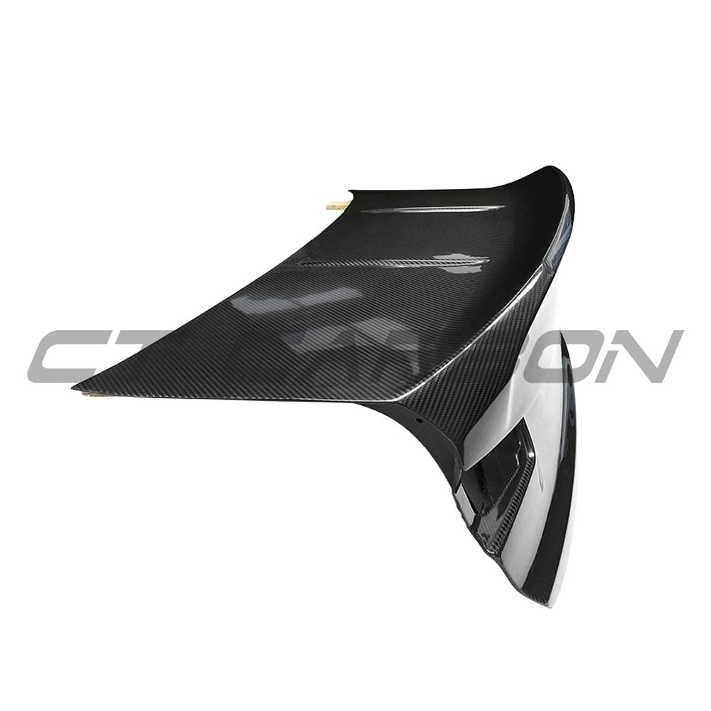 BMW G80 M3 and G20 3 Series carbon fiber bootlid by CT Carbon, showing sleek, lightweight full carbon trunk for sporty look.