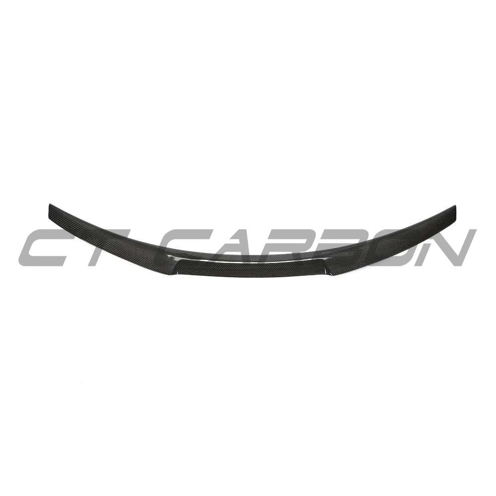 BMW M2 carbon fibre spoiler by CT Carbon for F87 and F22 2 Series, showcasing sleek aerodynamic design on the car.