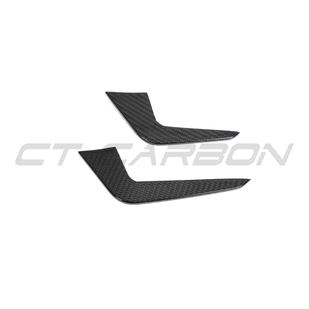 CT Carbon carbon fiber canards for Audi RS5 B9.5 Sportback and Coupe 2020-2025, shown on the vehicle's front bumper.