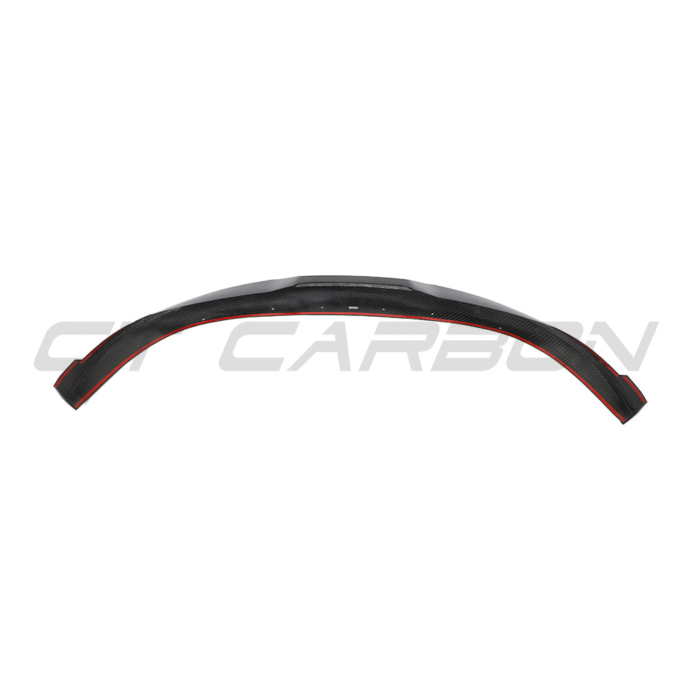 CT Carbon Porsche Taycan 2020-2024 carbon fiber splitter mounted on front of the car, enhancing aerodynamics and sporty appearance.
