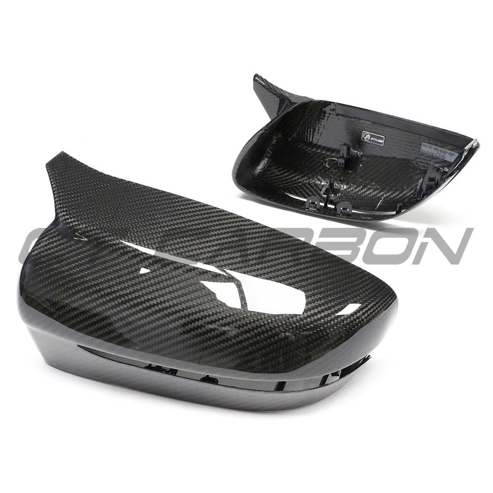 BMW G42 2 Series 2022+ RHD dry carbon mirror cover replacements by CT Carbon, showing sleek, lightweight mirror covers.