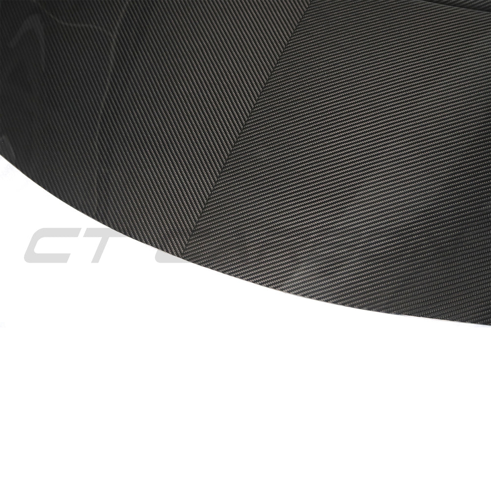 Toyota Supra 2019+ A90 carbon fiber front hood by CT Carbon, showing sleek, lightweight bonnet with textured carbon fiber surface.