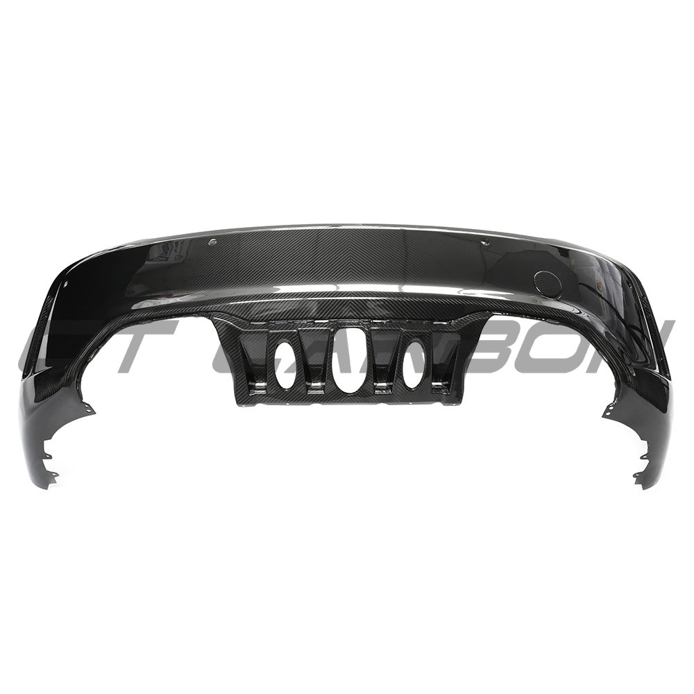 BMW F87 M2 carbon pre-preg fibre rear bumper by CT Carbon, showcasing the sleek, lightweight carbon fibre design for enhanced performance.