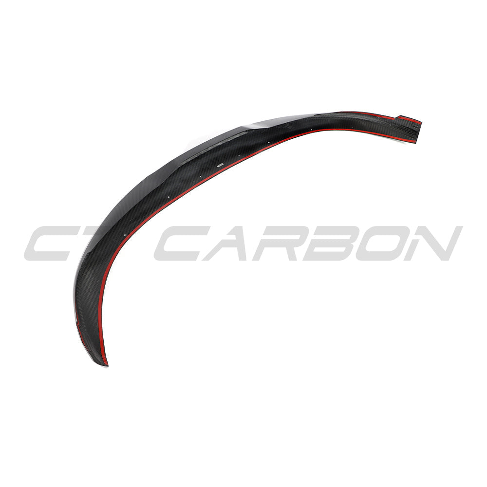 CT Carbon Porsche Taycan 2020-2024 carbon fibre splitter showing aerodynamic design and textured carbon fiber surface.