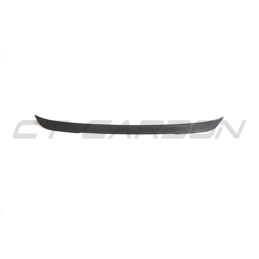 BMW G02 X4 and F98 X4M carbon fibre spoiler by CT Carbon, featuring sleek aerodynamic design on a modern sports SUV.