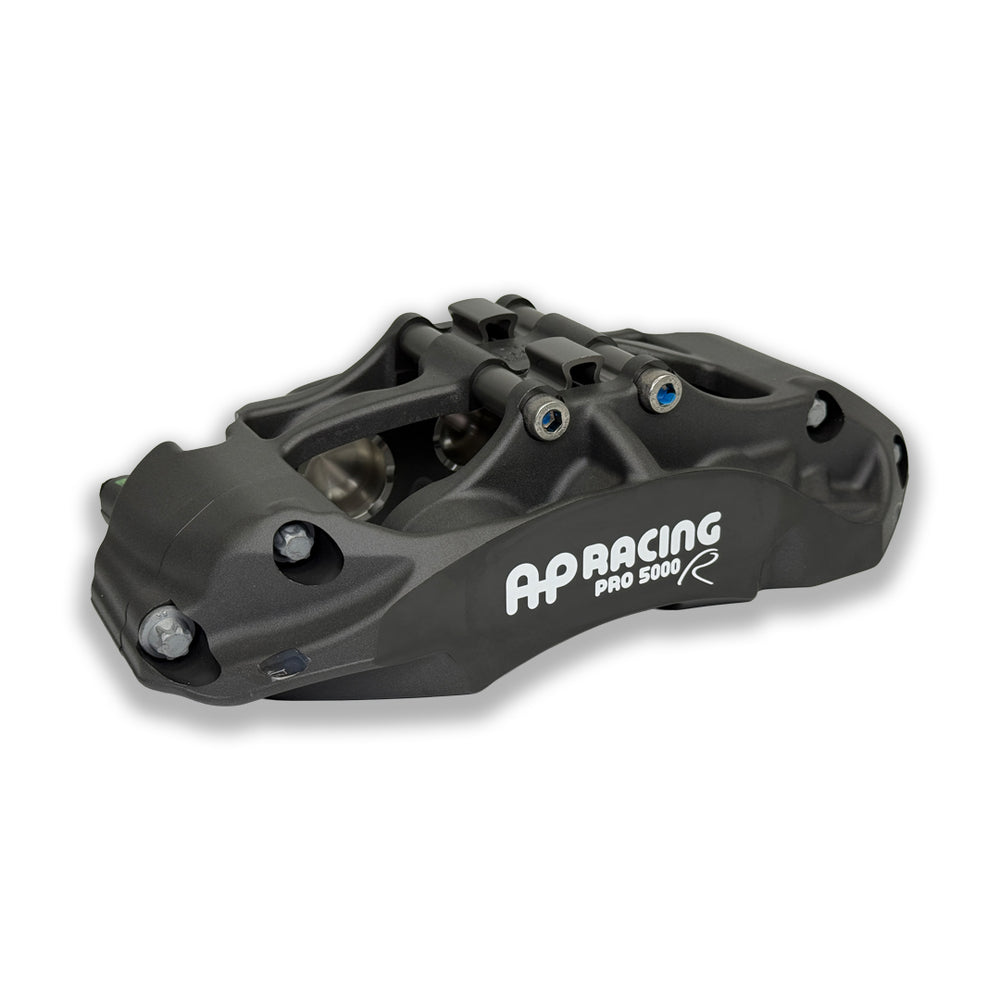 Pair of AP Racing Pro5000R big brake calipers with anodised finish and 6 pistons, part of AP Racing's high-performance brake kits.