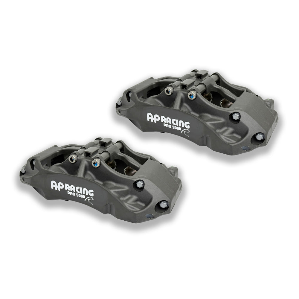 Pair of AP Racing Pro5000R CP9660-2S4L/3S4L big brake calipers with anodised finish, 6-piston design for high-performance braking.