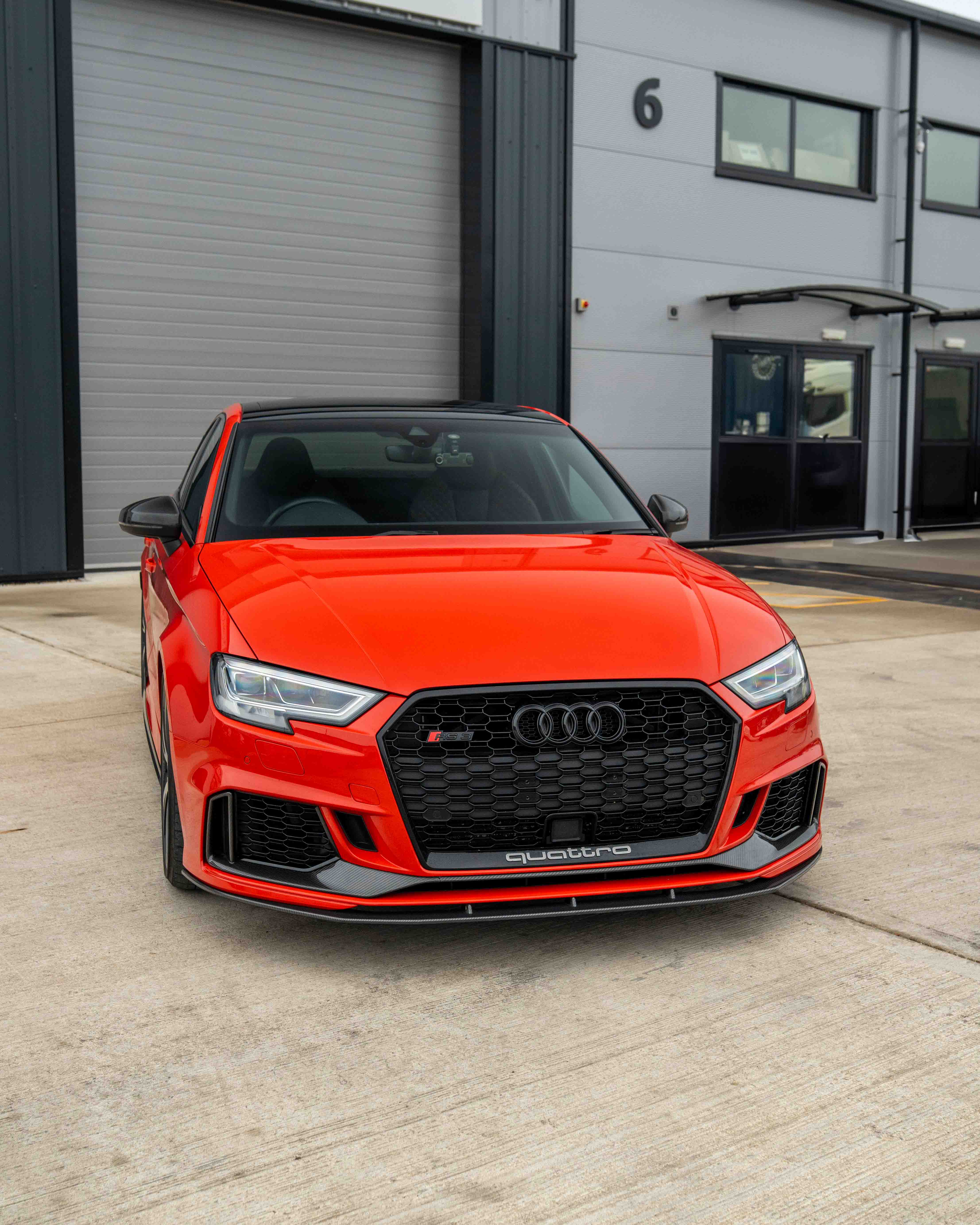 Audi A3 S3 RS3 8V carbon fiber mirror covers with lane assist, featuring sleek pre-preg carbon fiber design and modern safety tech.