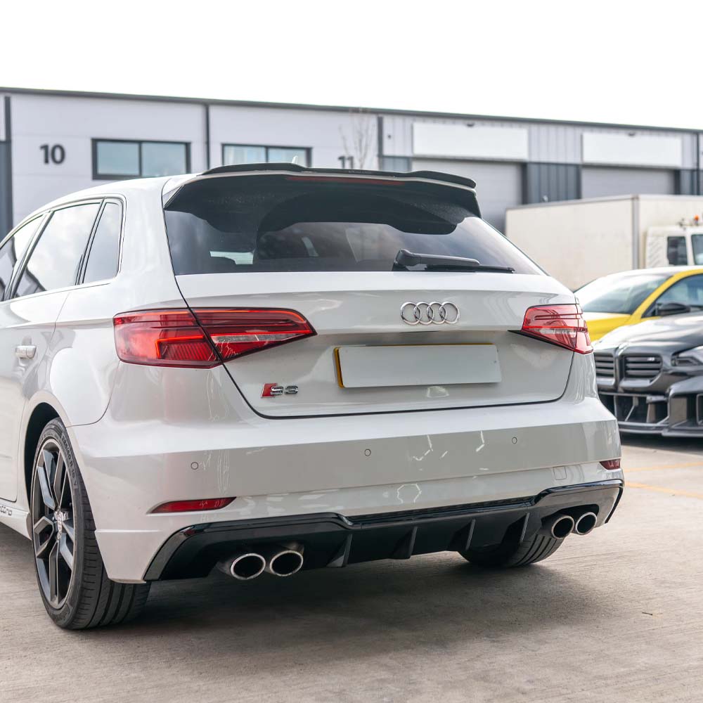 Gloss black diffuser for Audi A3/S3 8V facelift Sportback 5-door, designed by CT Carbon, shown installed on the vehicle.