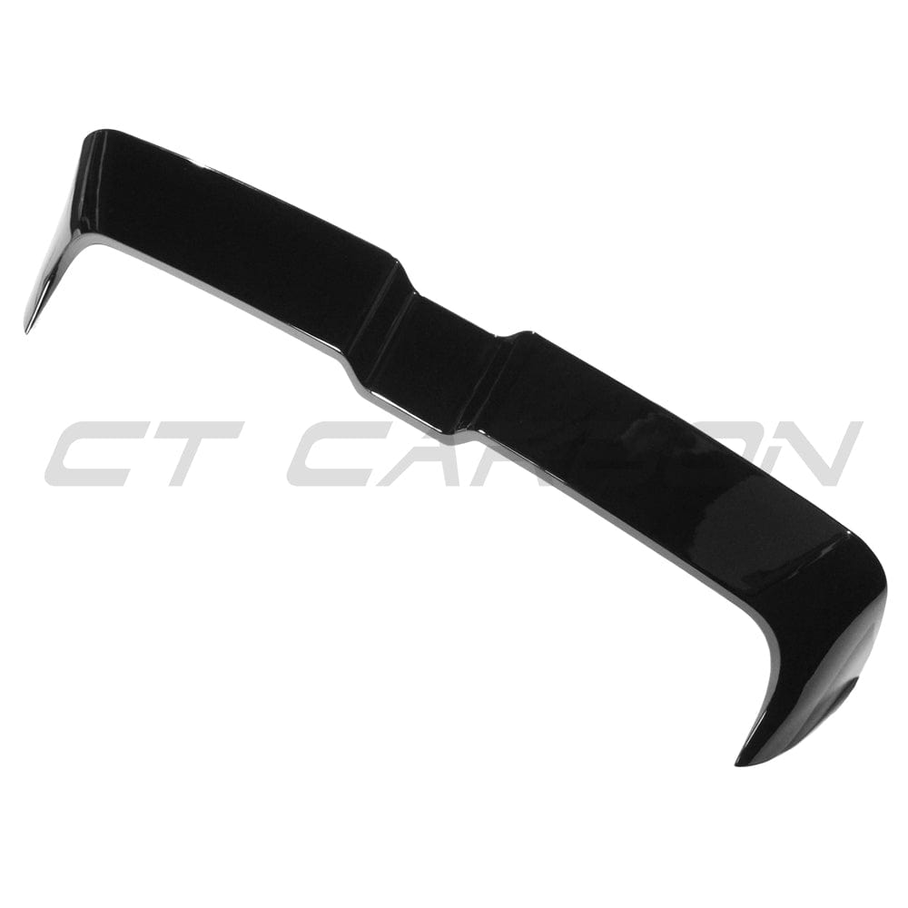 Gloss black spoiler for Audi A3/S3 8V Sportback 5-door, V2 style, by CT Carbon, installed on the rear of the vehicle.