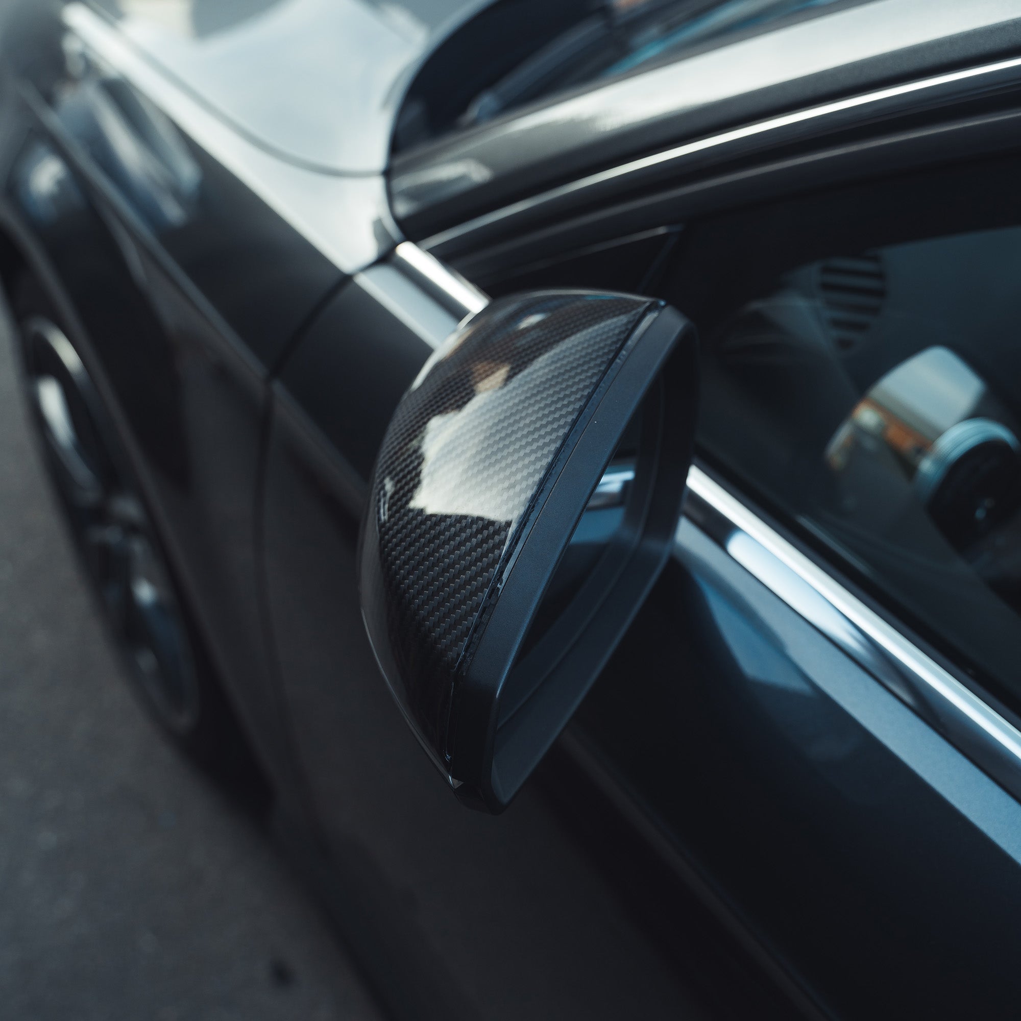 Audi A3/S3/RS3 8V pre-preg carbon fiber mirror covers from CT Carbon, without lane assist, showcasing sleek carbon fiber finish.