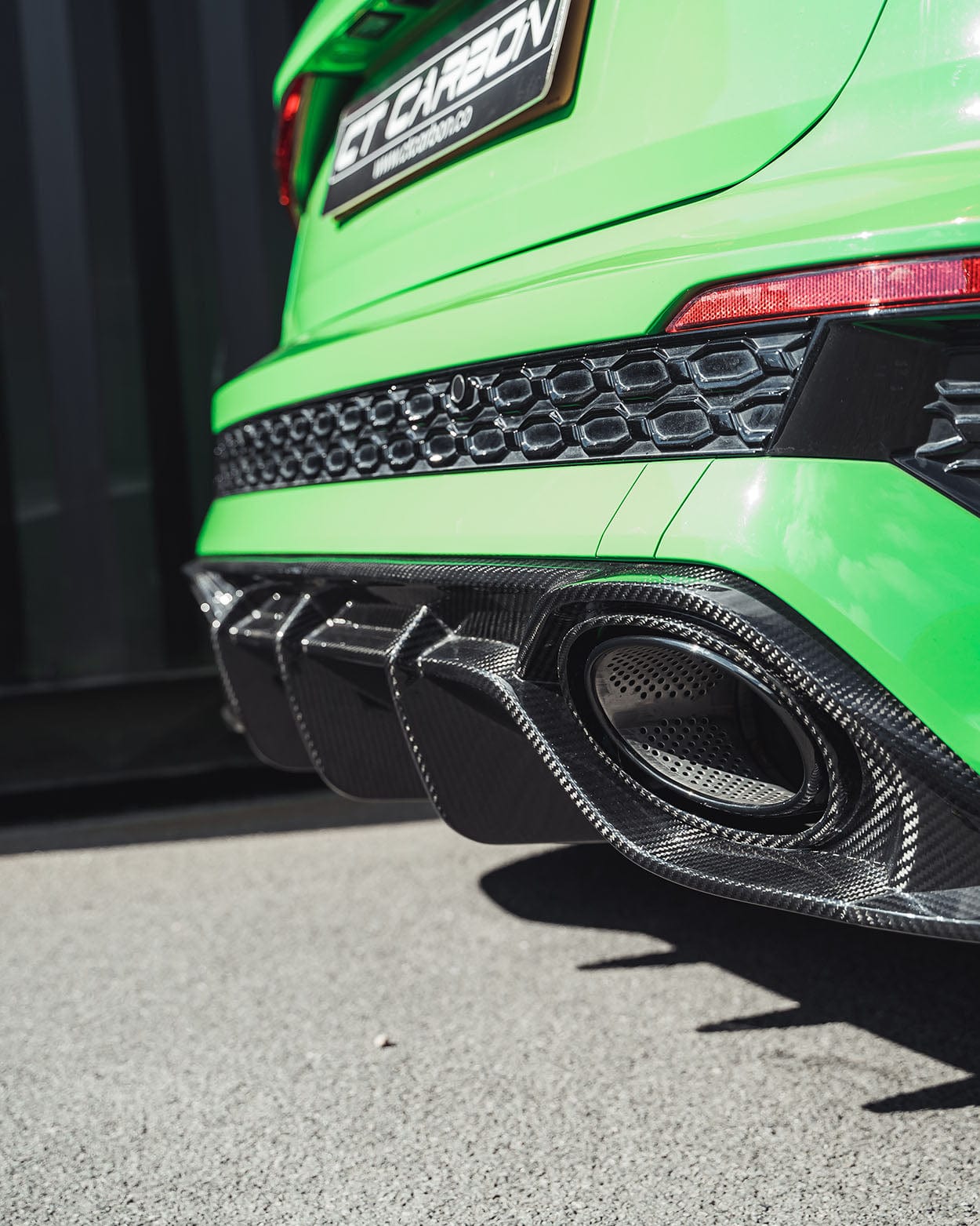 Full view of the CT Design carbon fiber kit installed on an Audi RS3 8Y Sportback model, showcasing the sleek, lightweight carbon components.