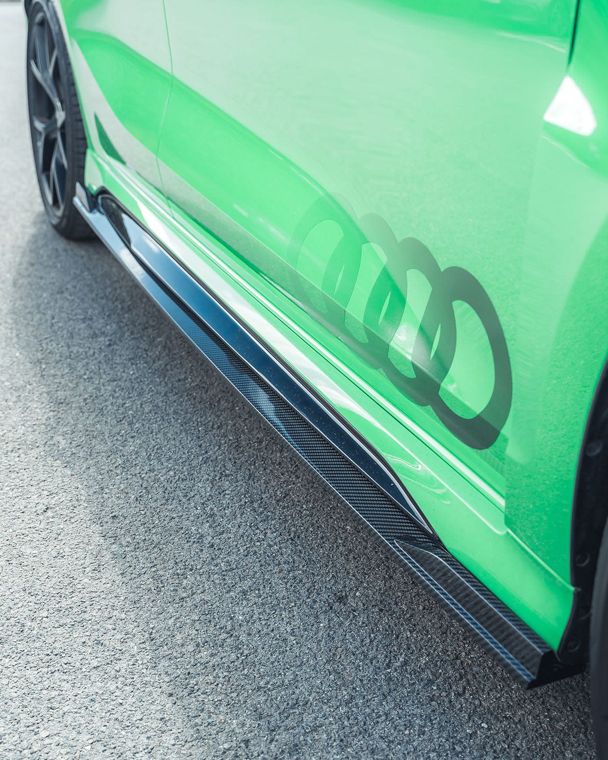 Audi RS3 8Y 2022+ carbon fibre side skirts by CT Design, showcasing sleek, lightweight aerodynamic enhancements on the vehicle.