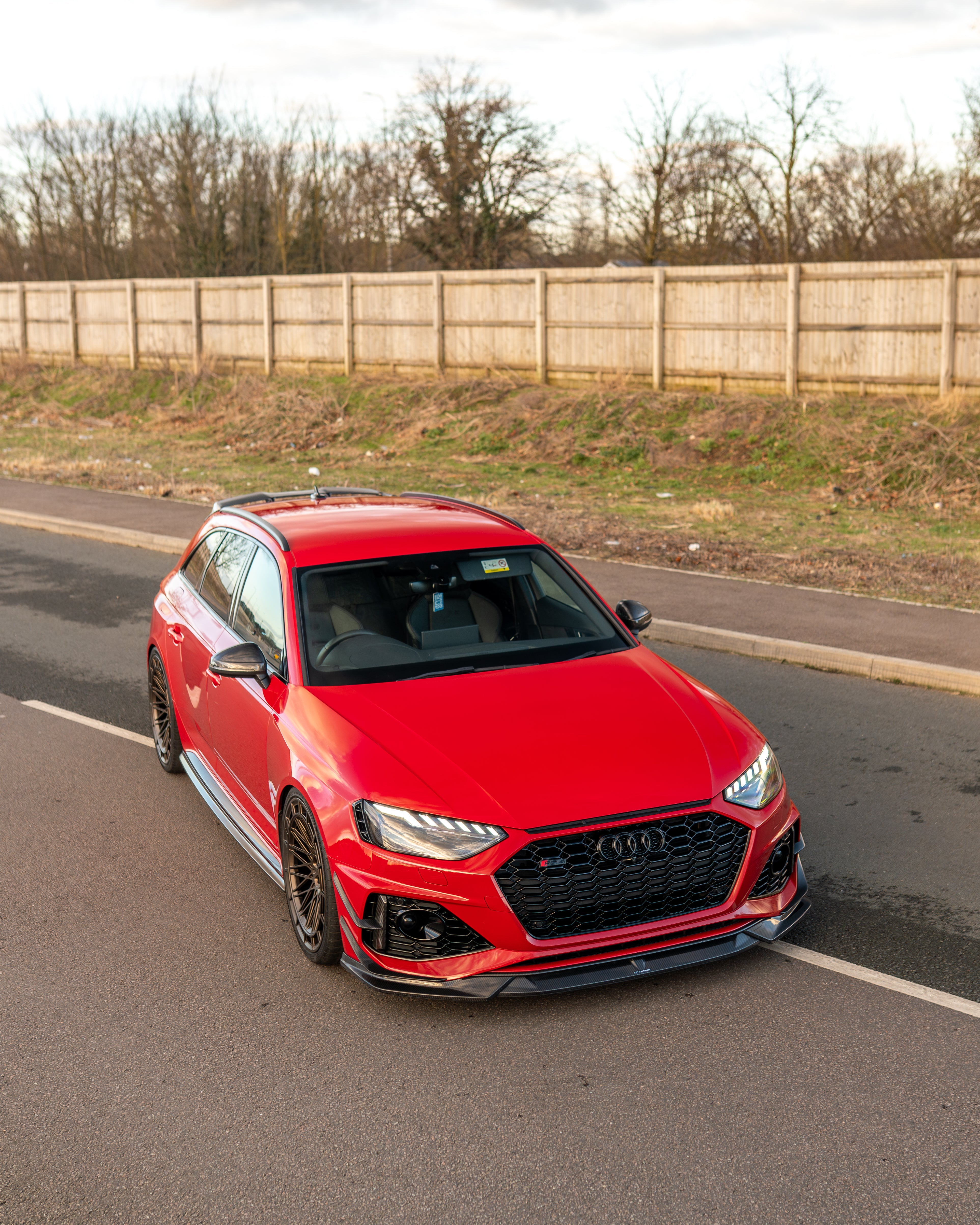 Audi RS4 B9.5 carbon fiber splitter from CT Design, featuring a sleek, aerodynamic front splitter with visible carbon fiber texture.