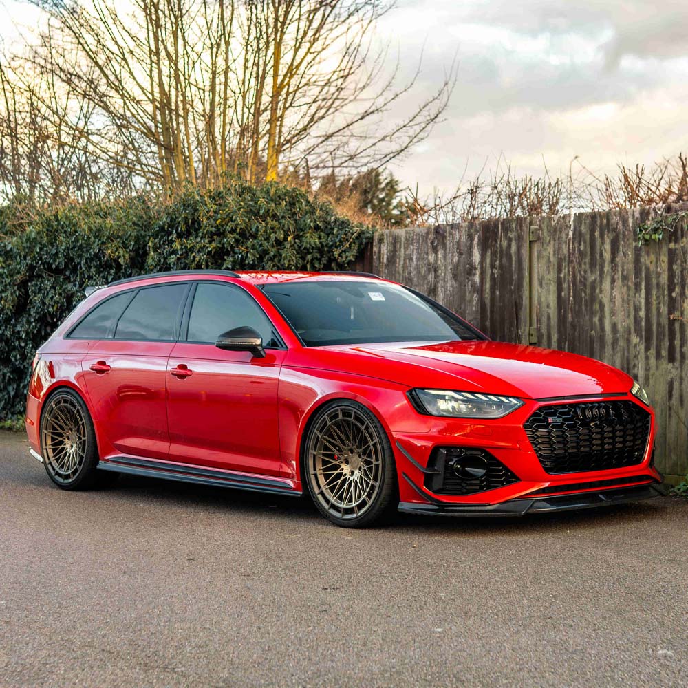 Audi RS4 B9.5 carbon fiber front canards by CT Design, showcasing sleek, aerodynamic accessories for enhanced performance.