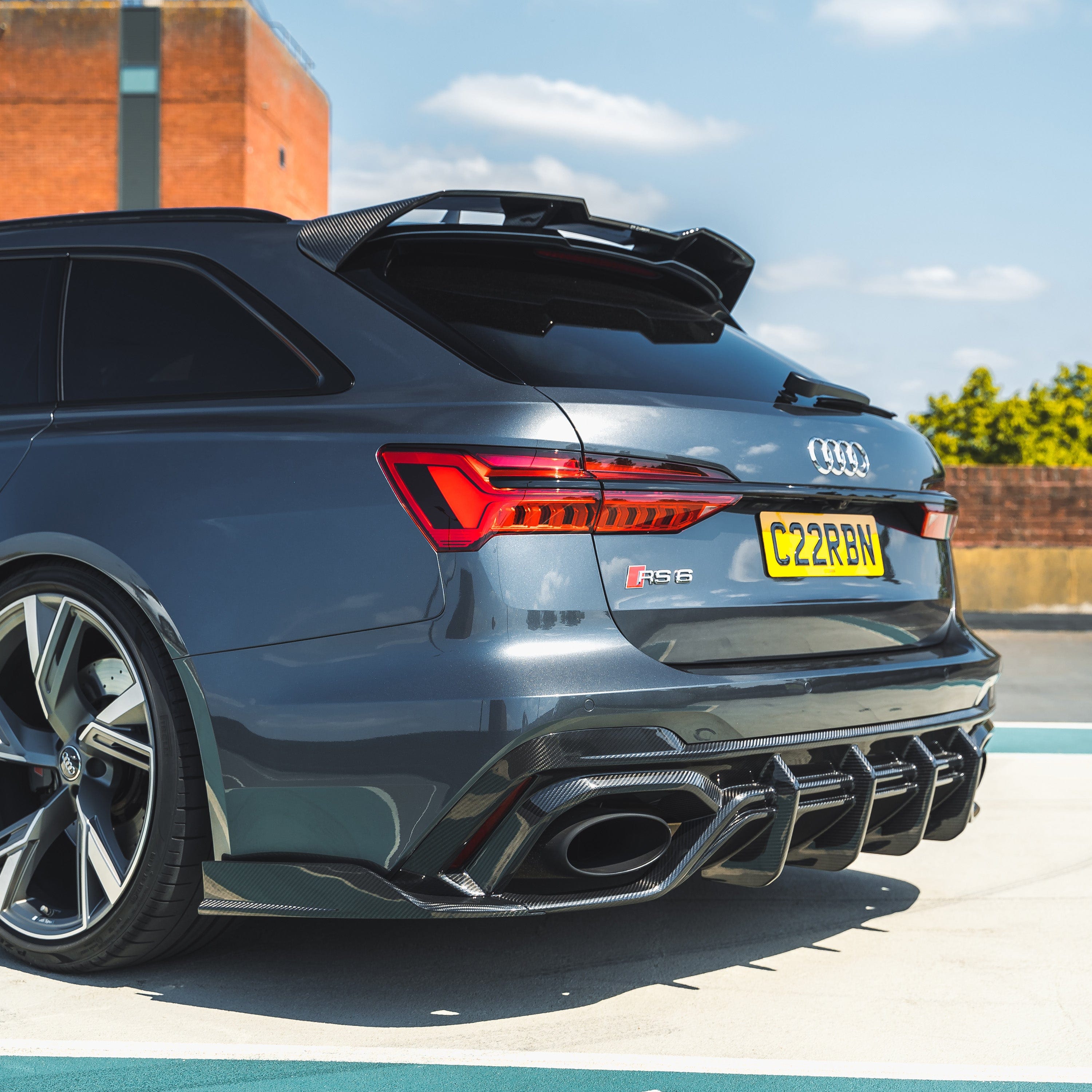 Audi RS6 C8 Avant full carbon fiber kit by CT Carbon, featuring sleek carbon fiber panels and accents on the vehicle.