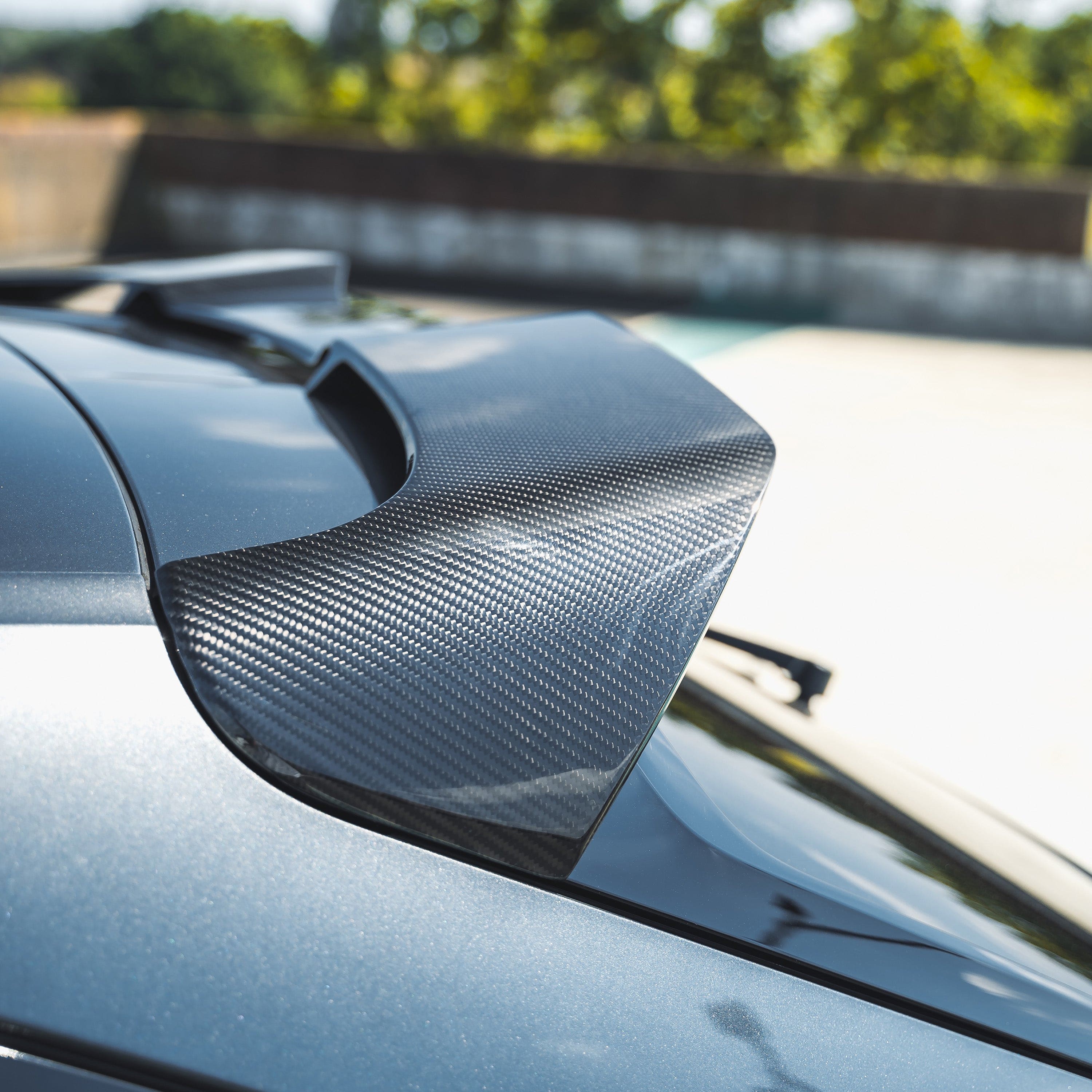 Full view of the AUDI RS6 C8 Avant CT Design carbon fiber kit installed on the car, showcasing sleek, lightweight carbon fiber details.